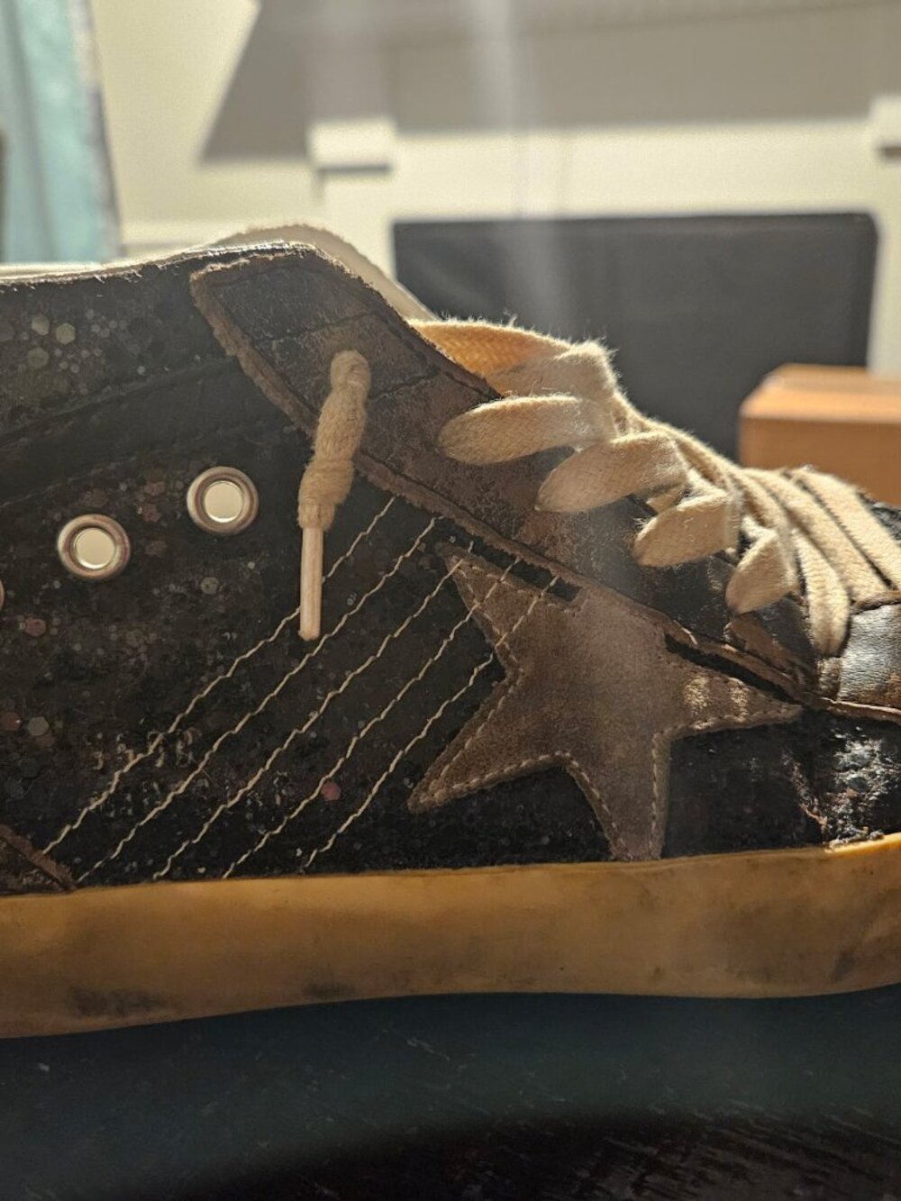 Women’s Mid Star in black glitter with dove-gray suede star and heel tab